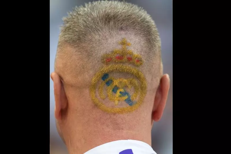 تصویر صفحه رئال مادرید از مدل موی جالب یک هوادار